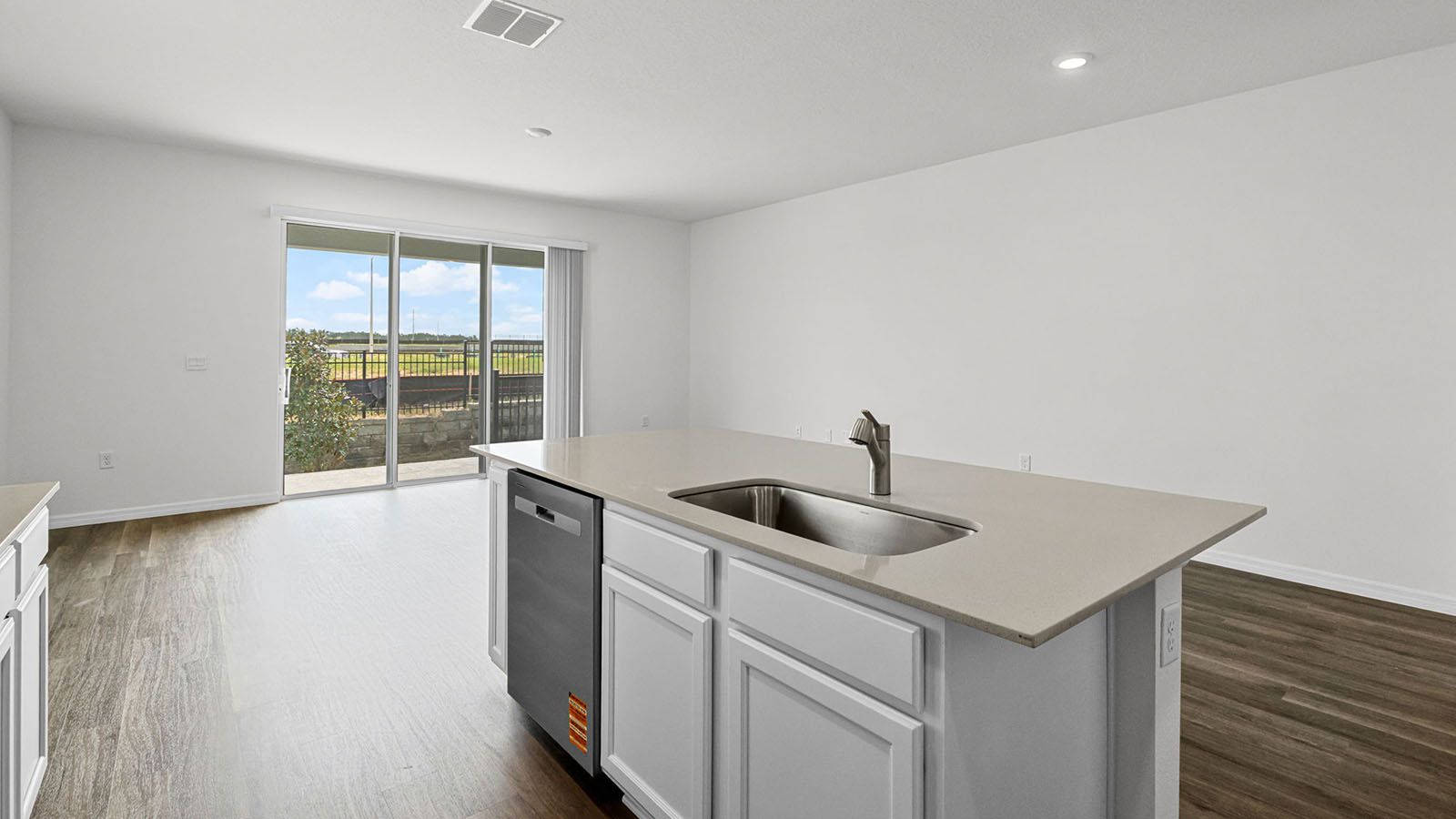 Kitchen Island and stainless steel appliances