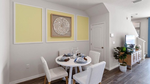 Dining nook with decorated four seat table