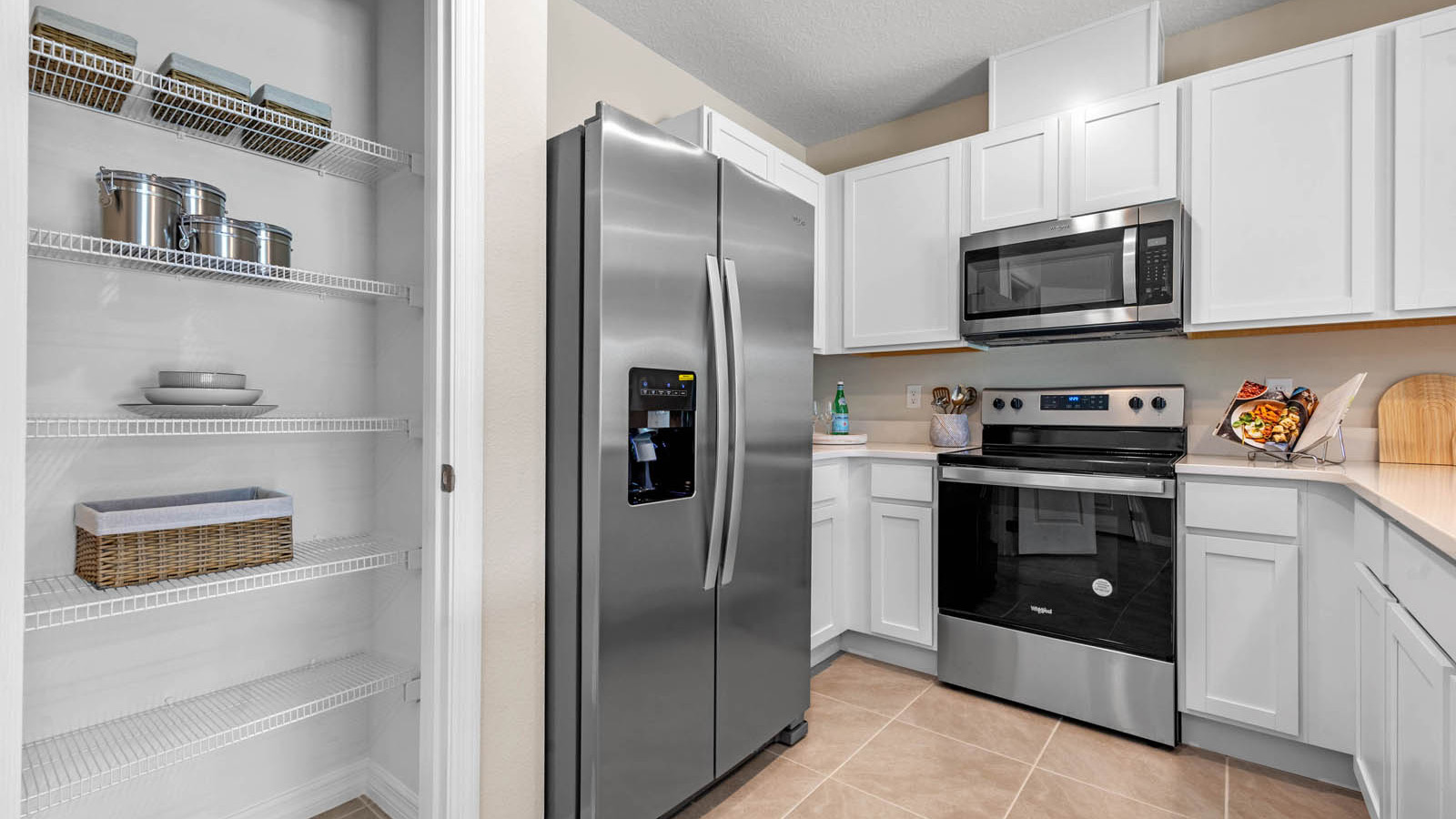 Kitchen with pantry and stainless steel appliances