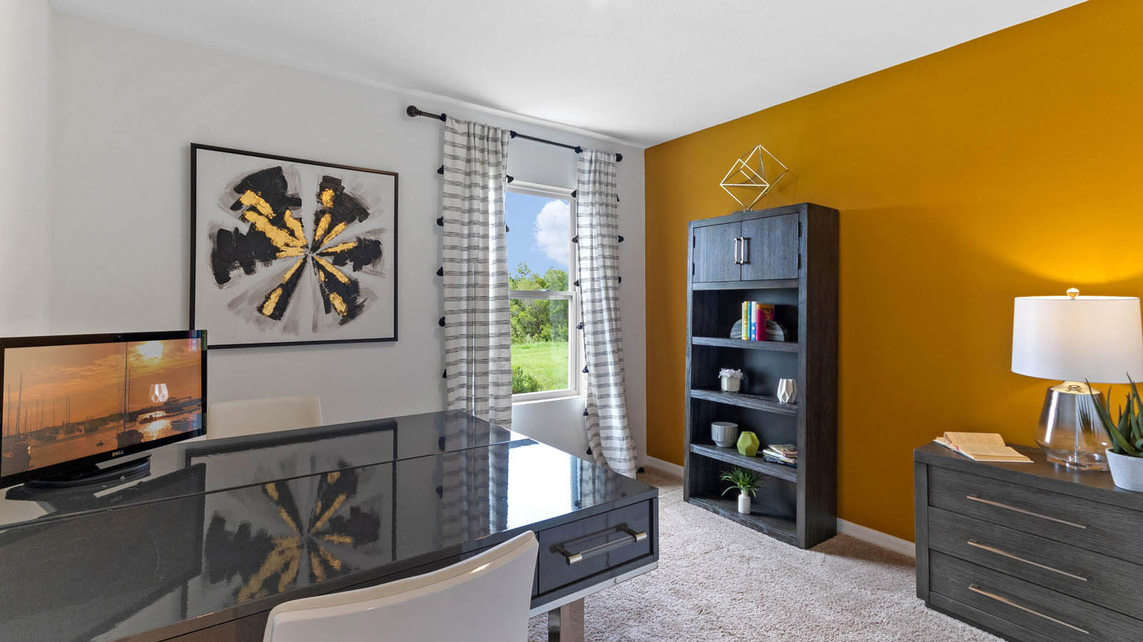 Office space with desk and book shelf