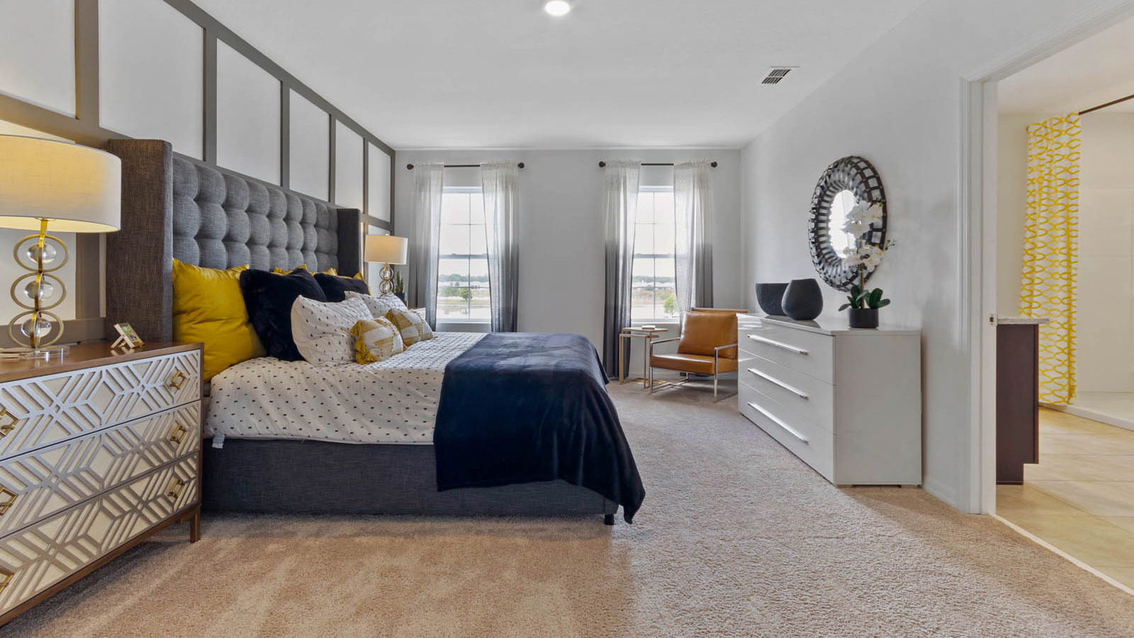 primary bedroom with view of the bathroom
