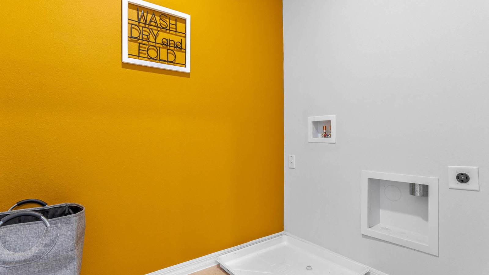 Laundry room with ceramic tile floors