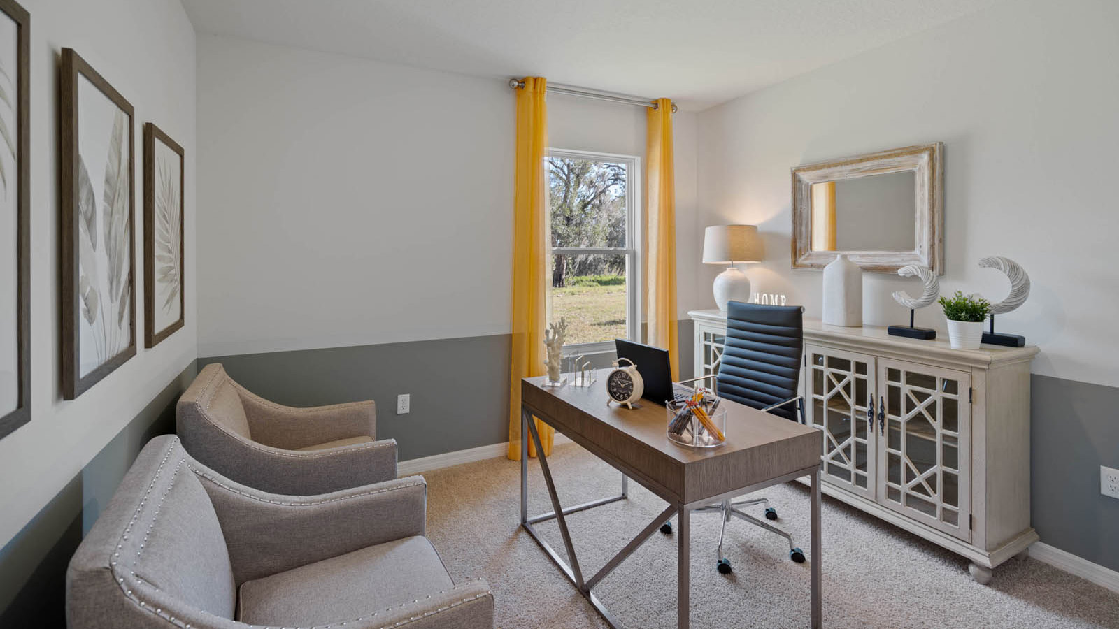 Office space with 2 chairs a desk and window