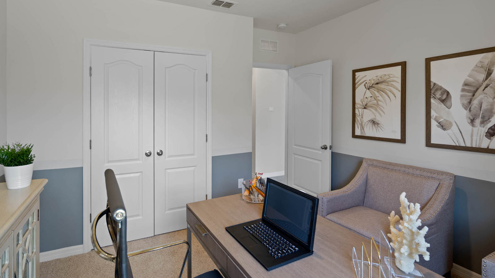 view of inside of the office with closet space