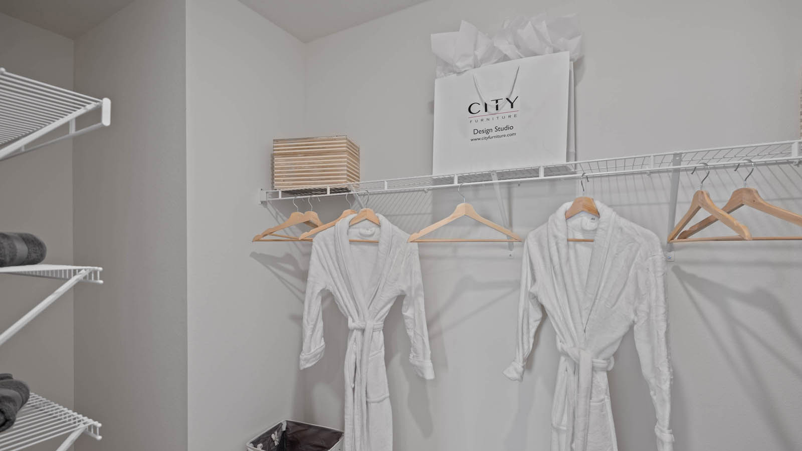 Walk in closet with carpet throughout