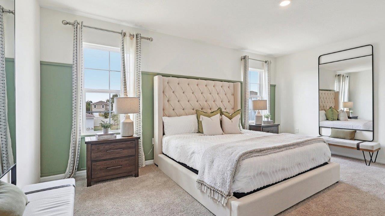 Primary bedroom with two windows for natural light