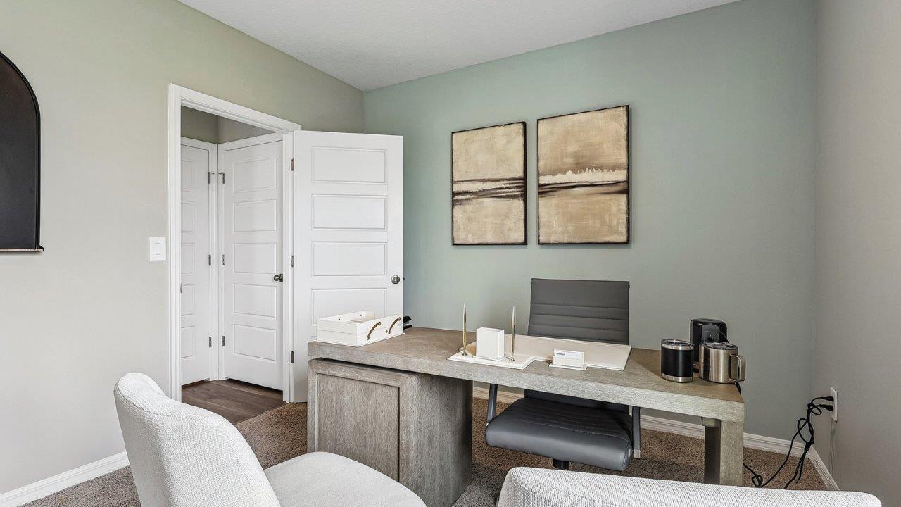 Bedroom downstairs decorated as an office