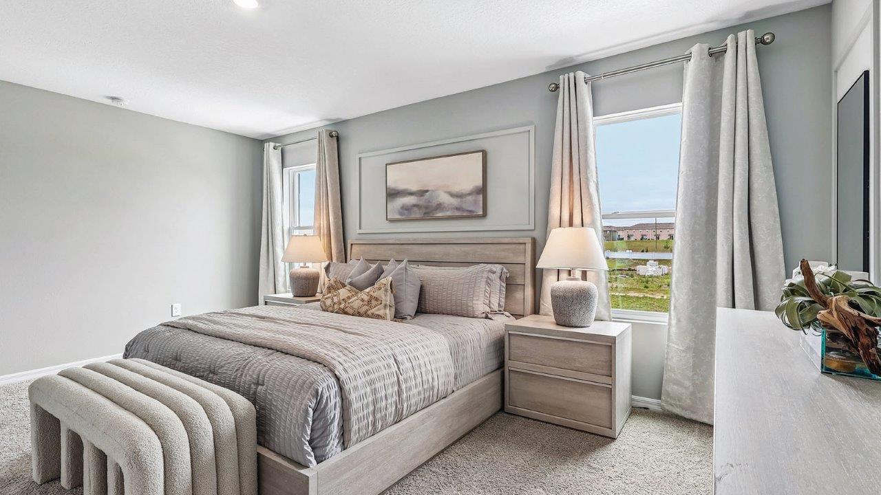 Primary bedroom with two windows for natural light