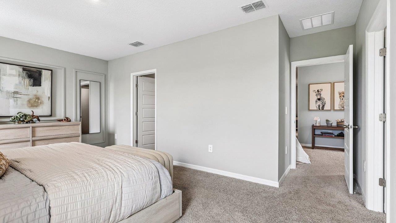 Primary bedroom with ensuite bathroom access