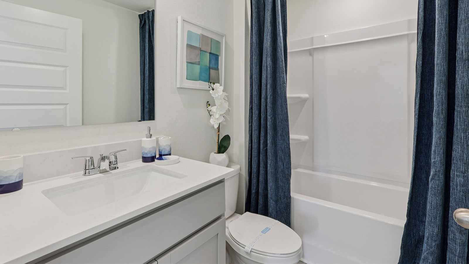 Guest bedroom with closet and queen size bed
