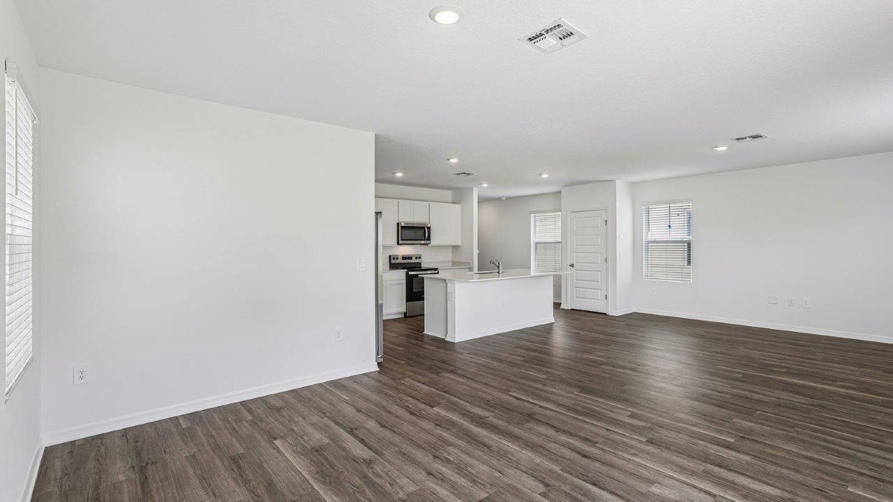 Open concept living space with dining room and kitchen