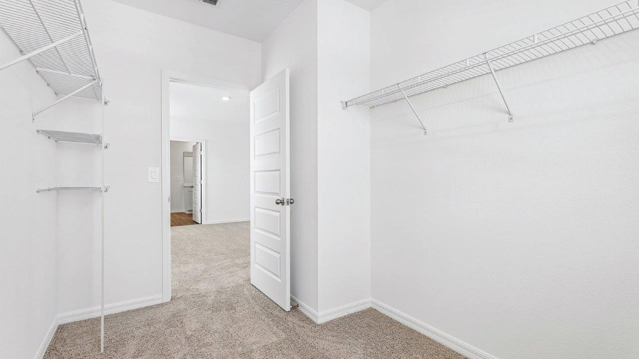 Large walk-in closet for primary bedroom