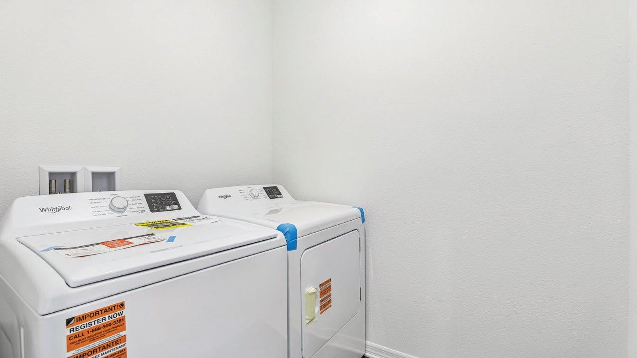 Laundry room with washer and dryer