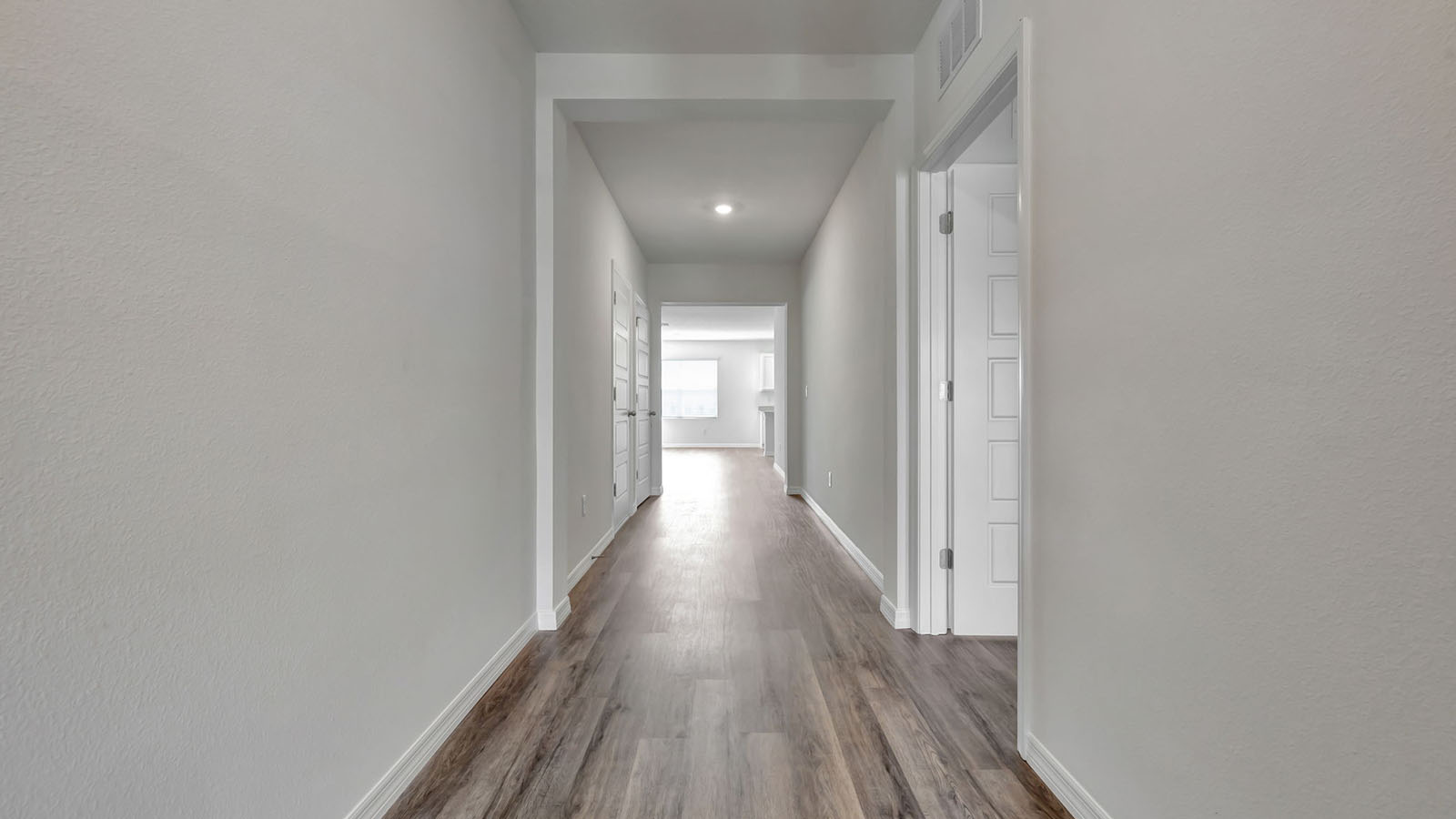 Entryway with access to living space and door to NextGen suite