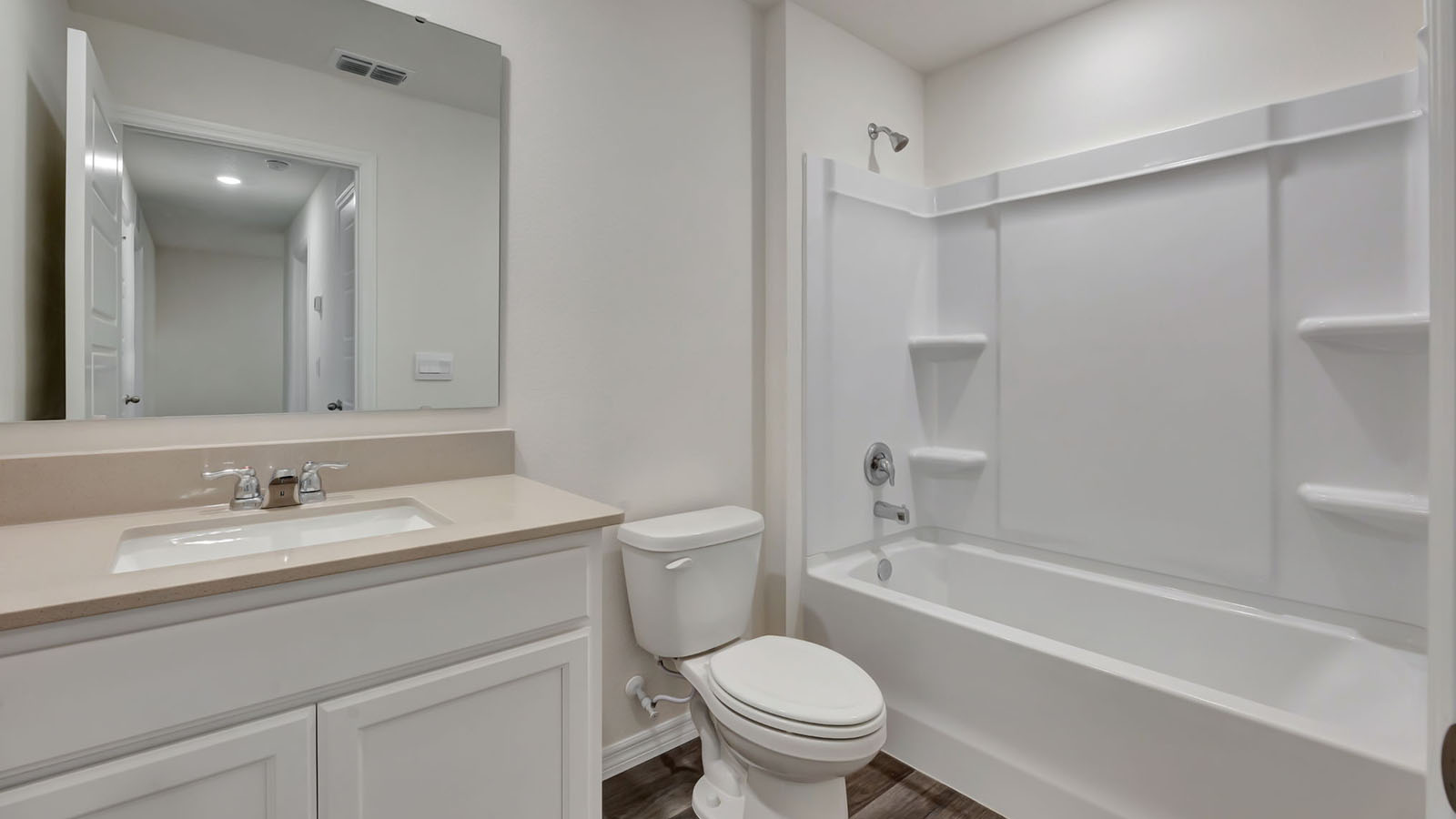 Upstairs guest bathroom with tub and shower combo