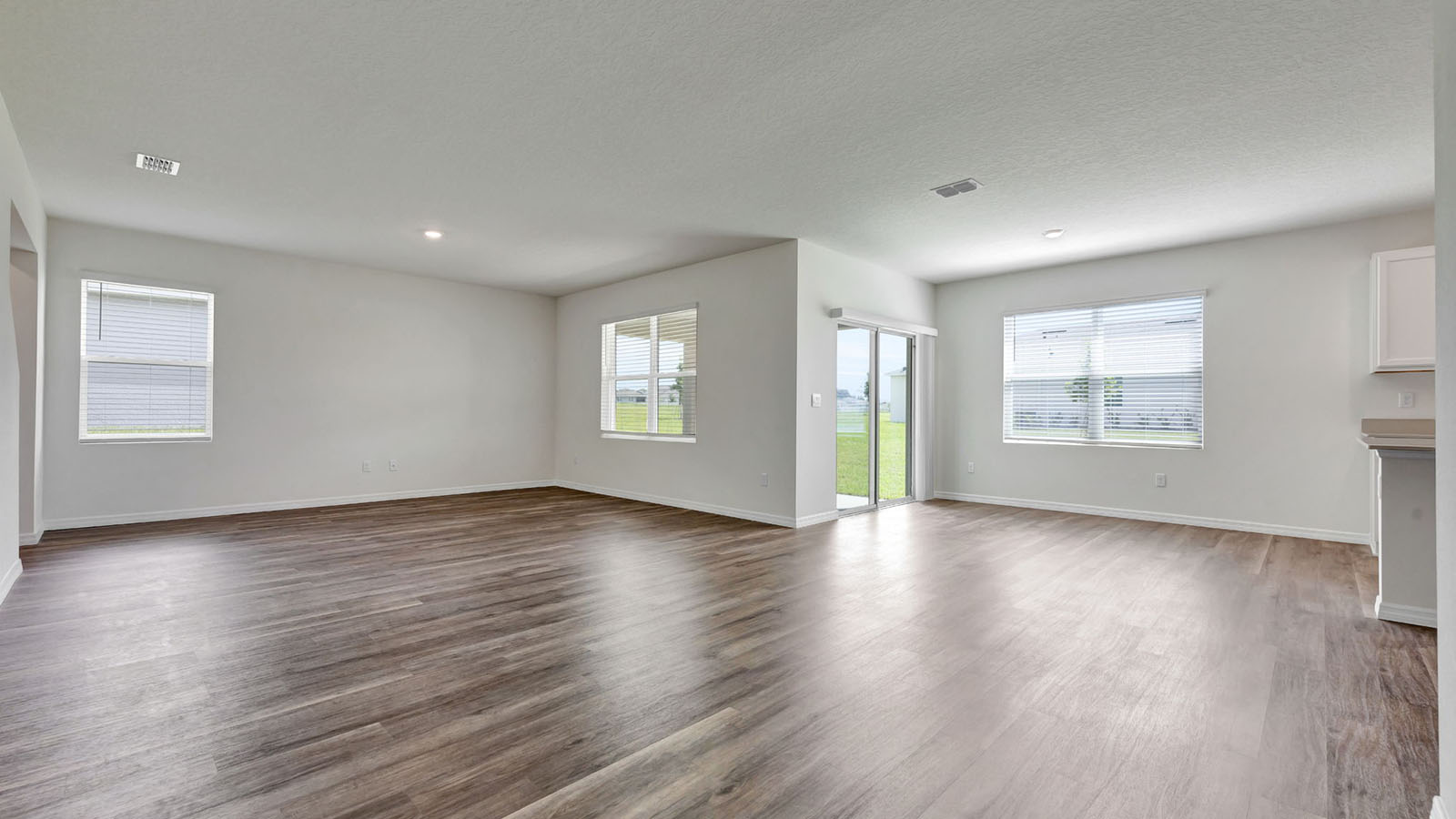Spacious living room and dining room attached to lanai and kitchen