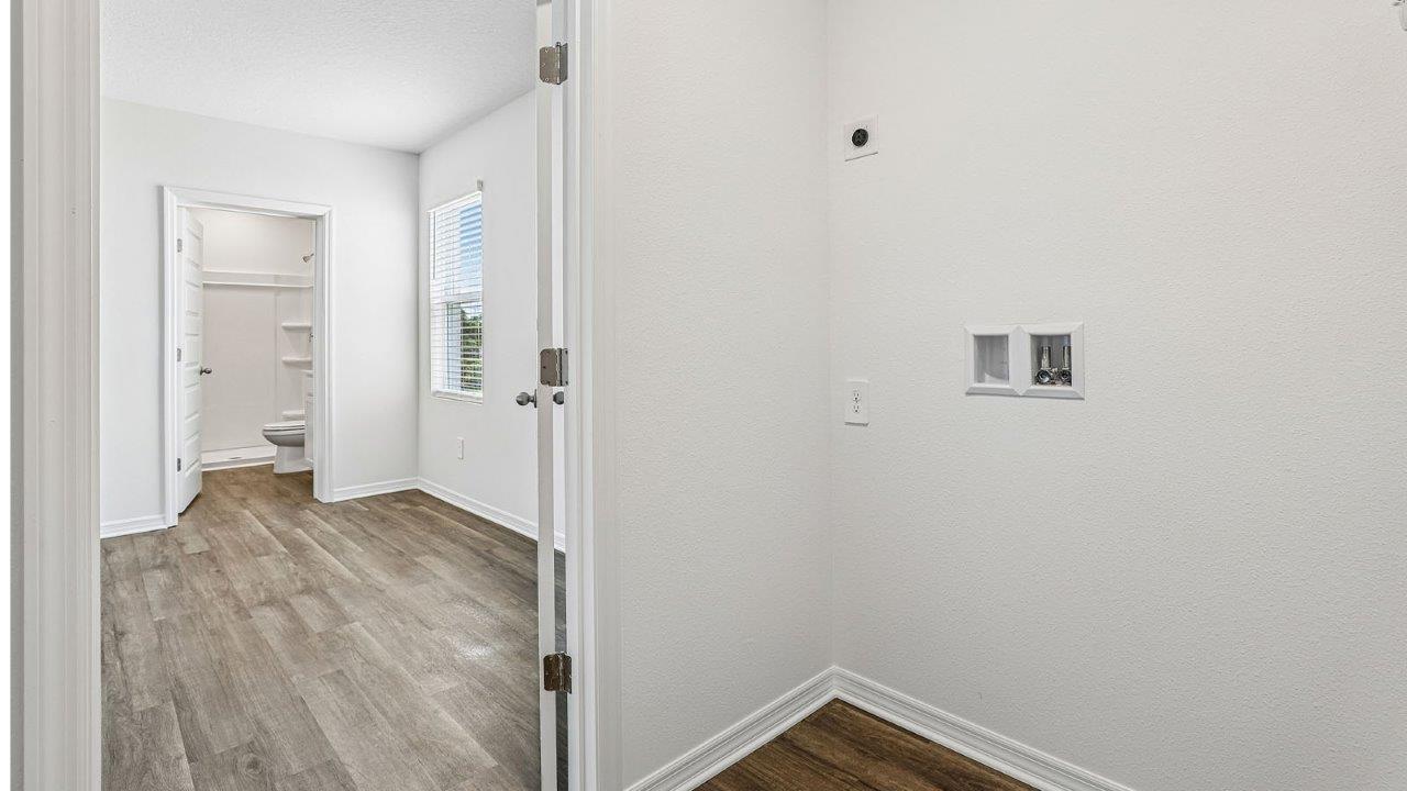 multi-gen closet with hookups for washer and dryer