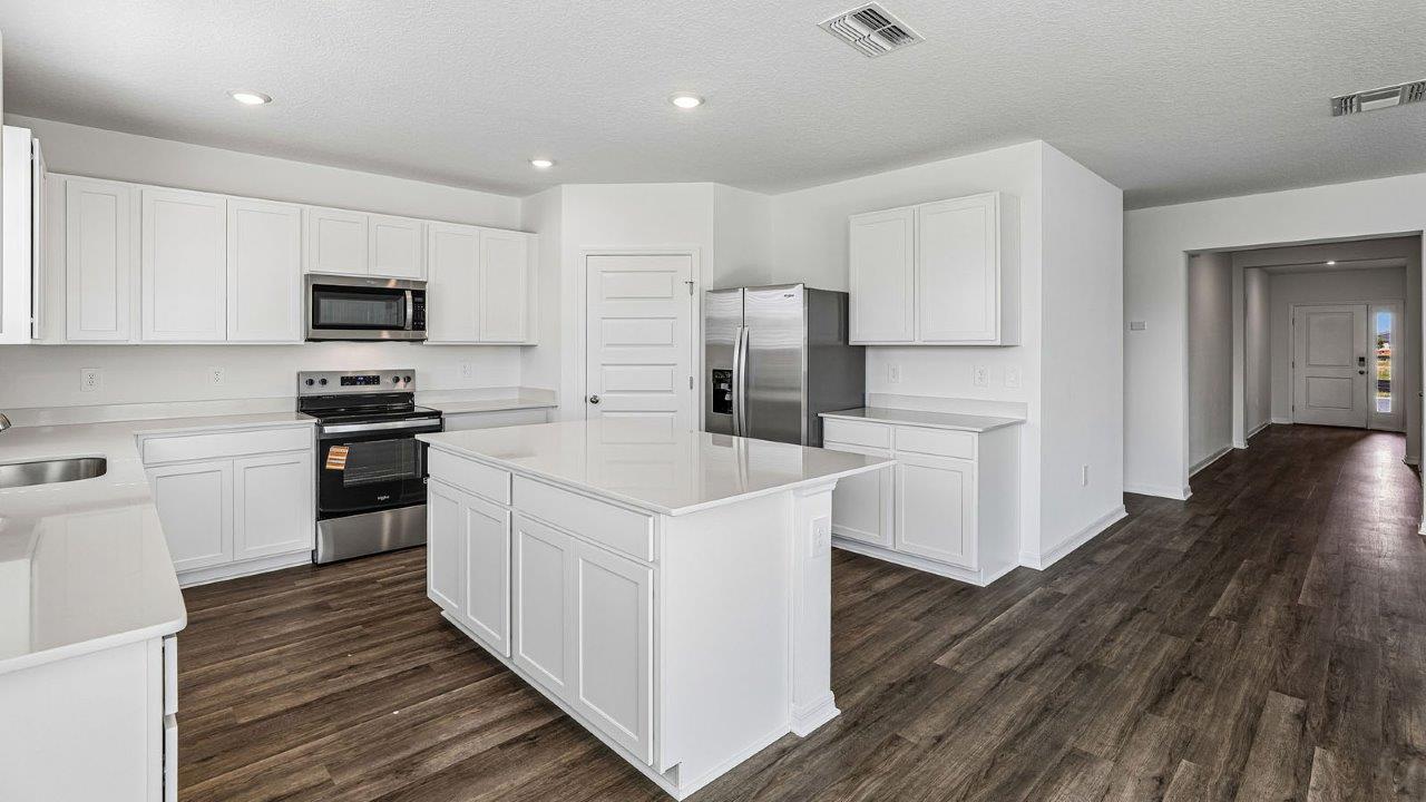 kitchen with view of entry hallway