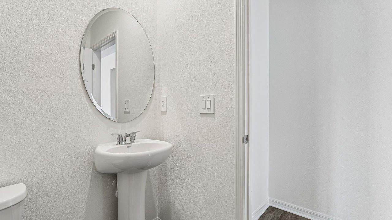 half bathroom with sink