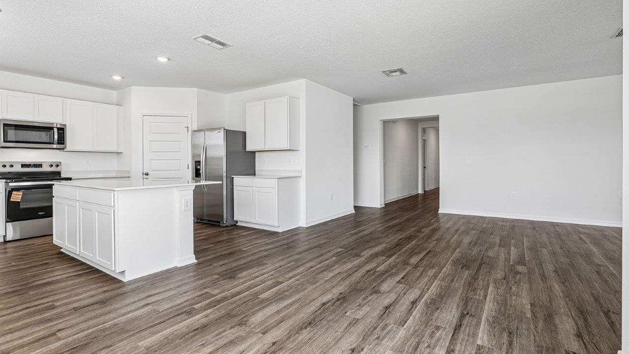 Living room with view of the kitchen