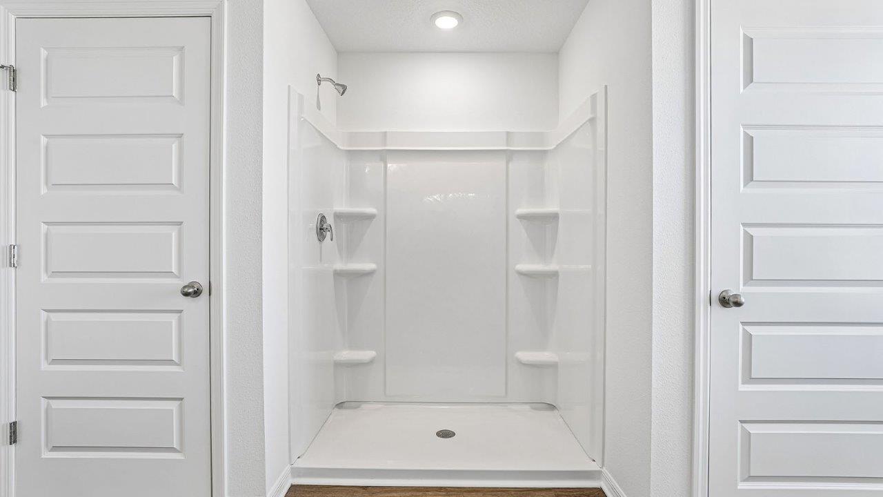 primary bathroom with walk in shower