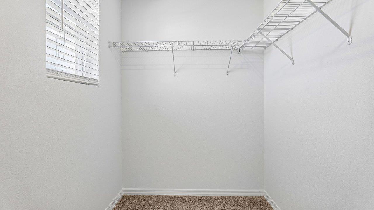 primary closet with wire racks