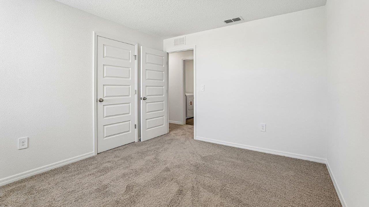 guest bedroom with closet
