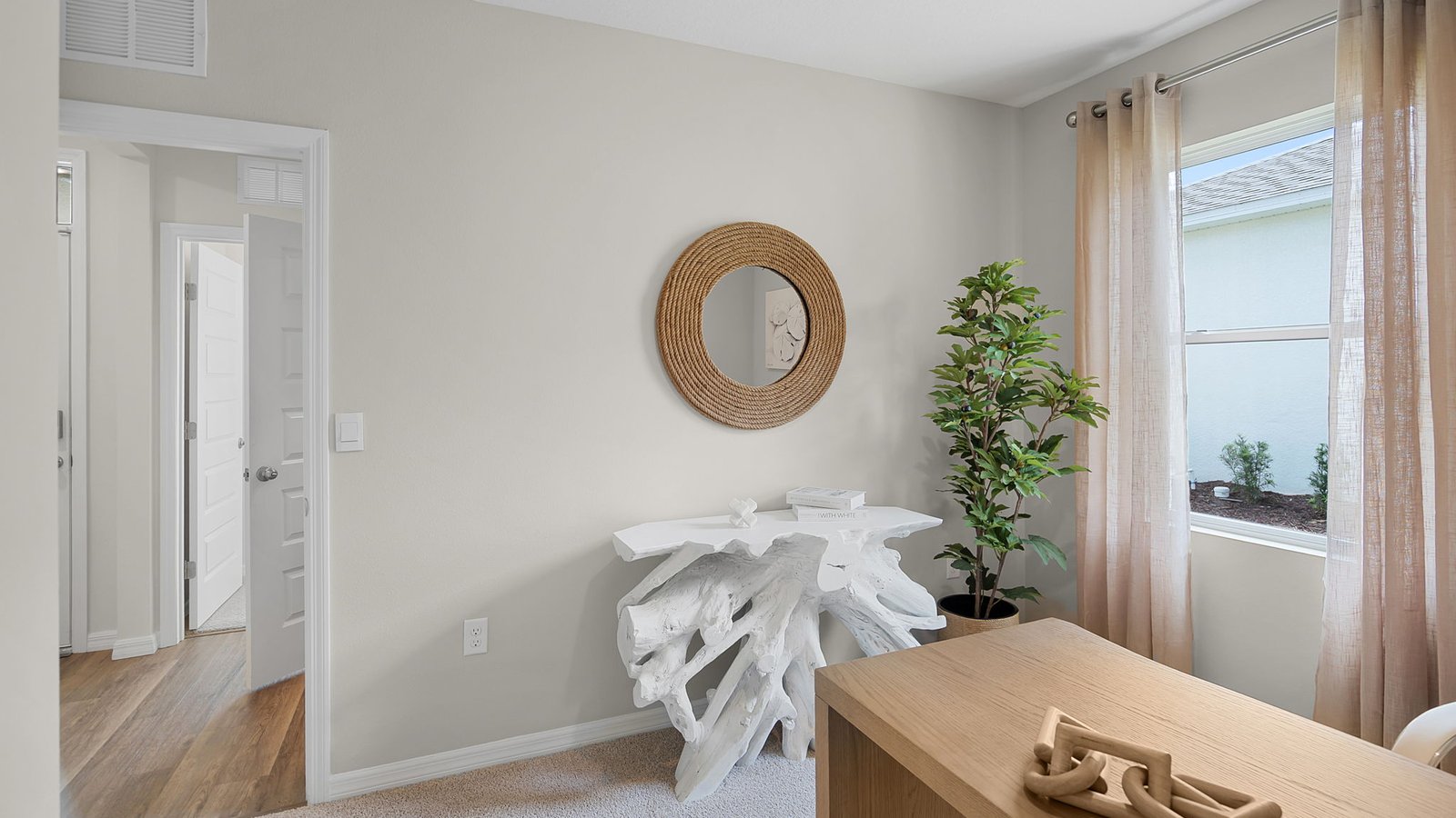 office with large window and carpet