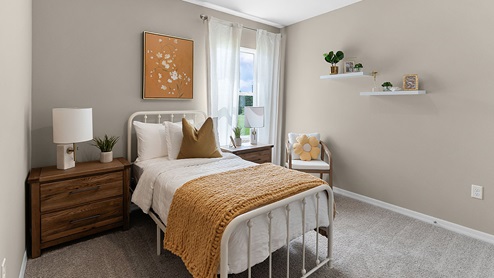 Guest bedroom with carpet throughout