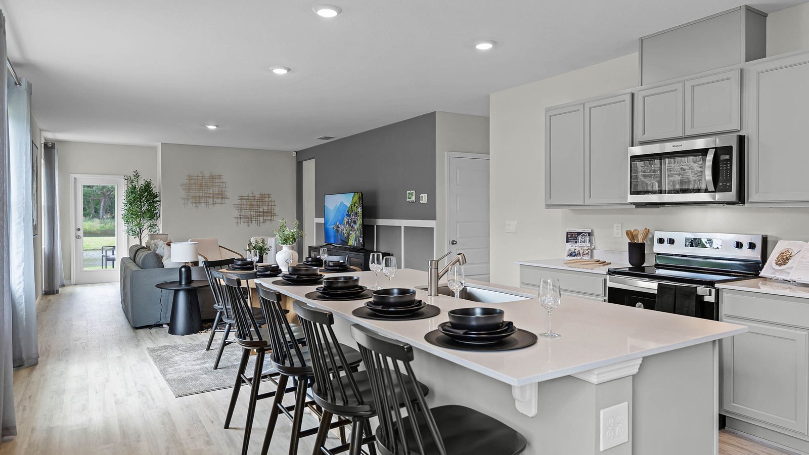 Kitchen view overlooking the dining area and living room