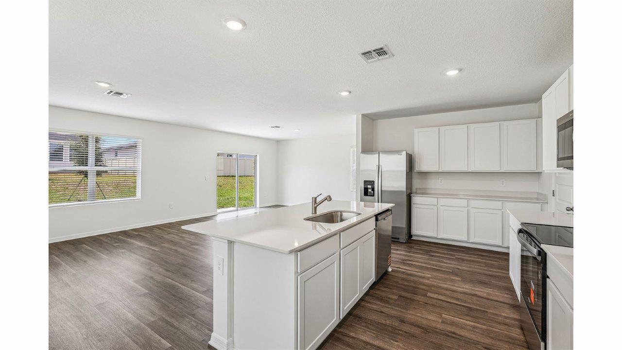 Kitchen island overlooking the living and dining areas