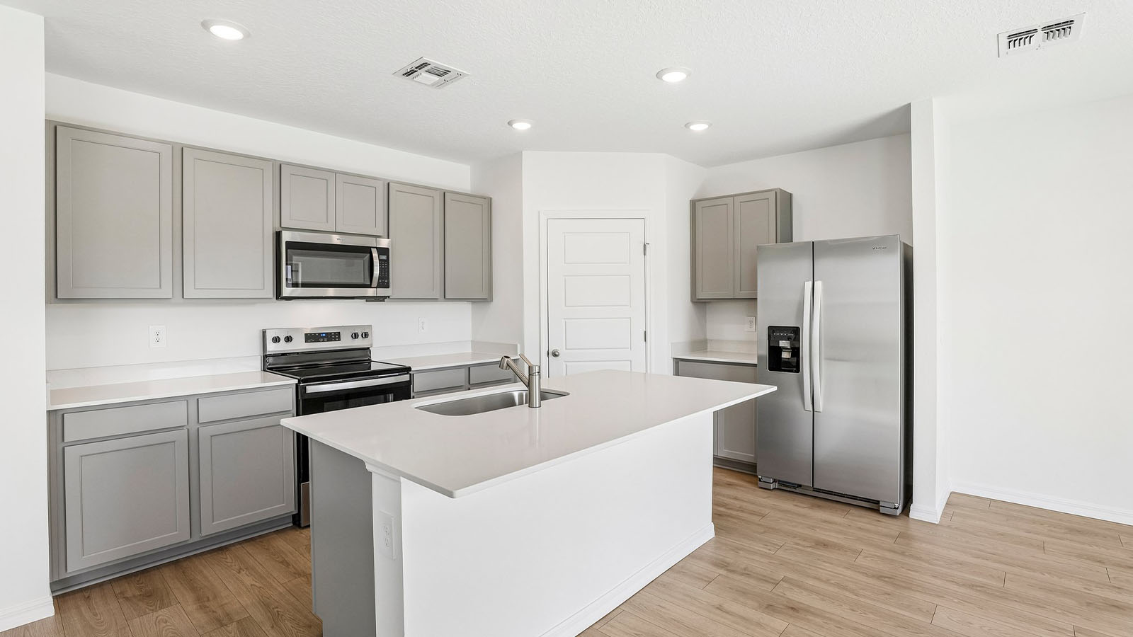 Kitchen with island and pantry