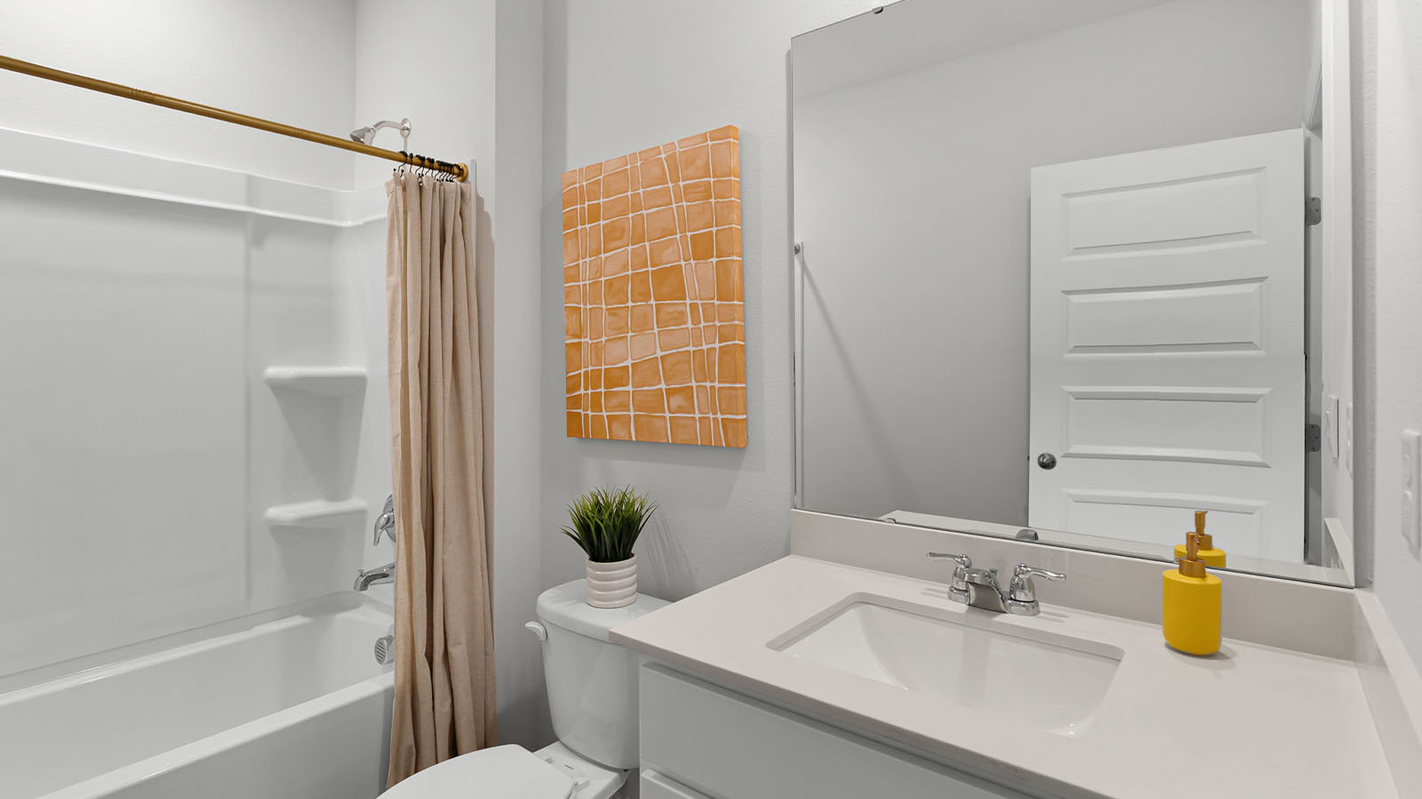 Guest bathroom with sink, tub/shower