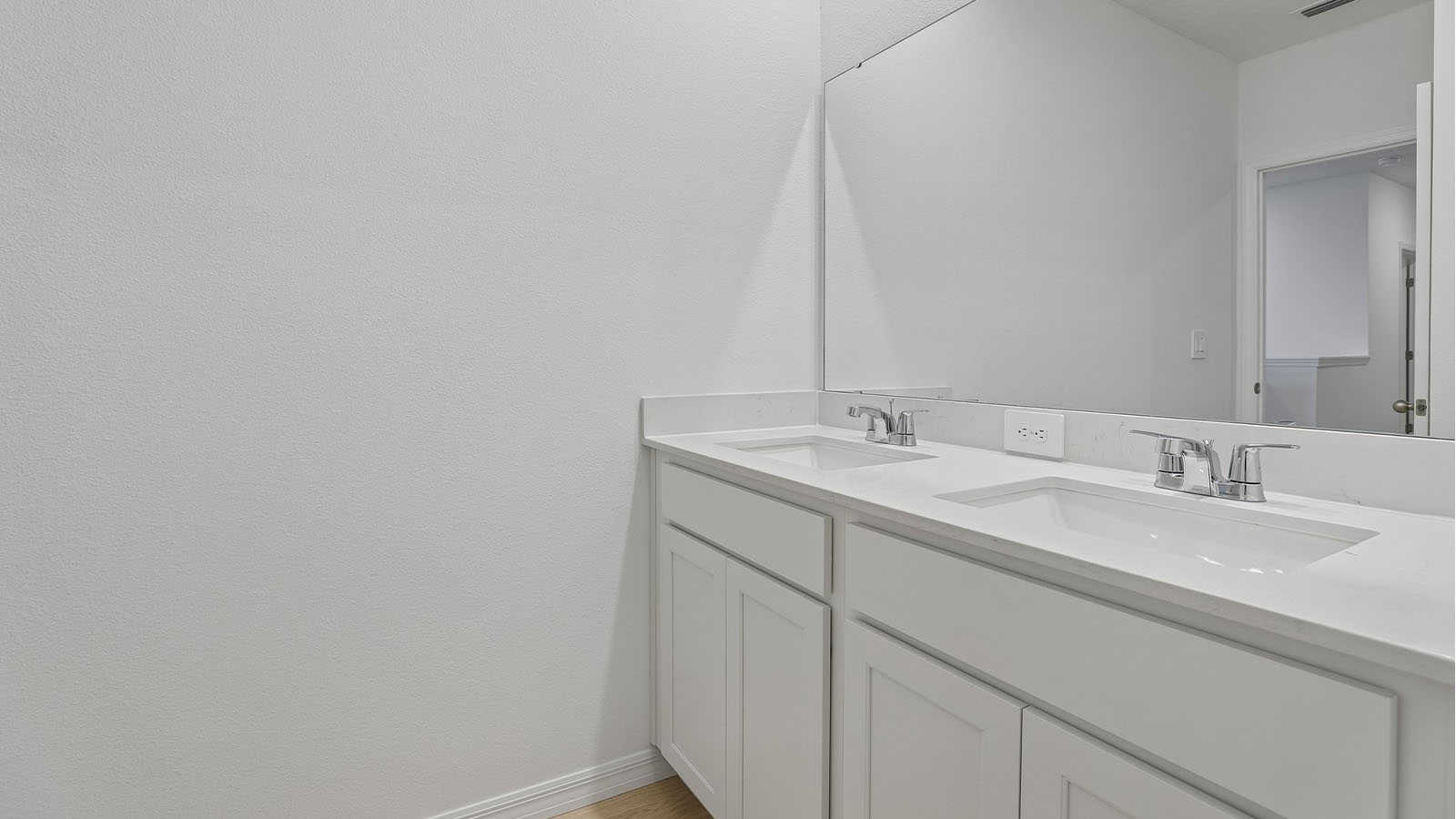 Downstairs bathroom with double vanity sink