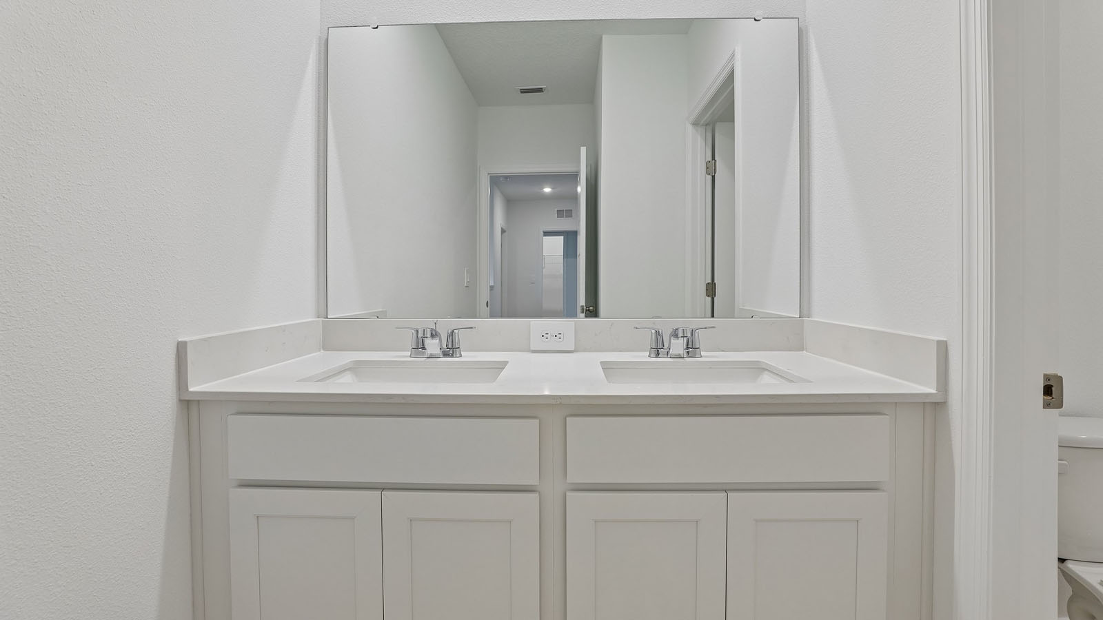 Downstairs bathroom with double vanity sink