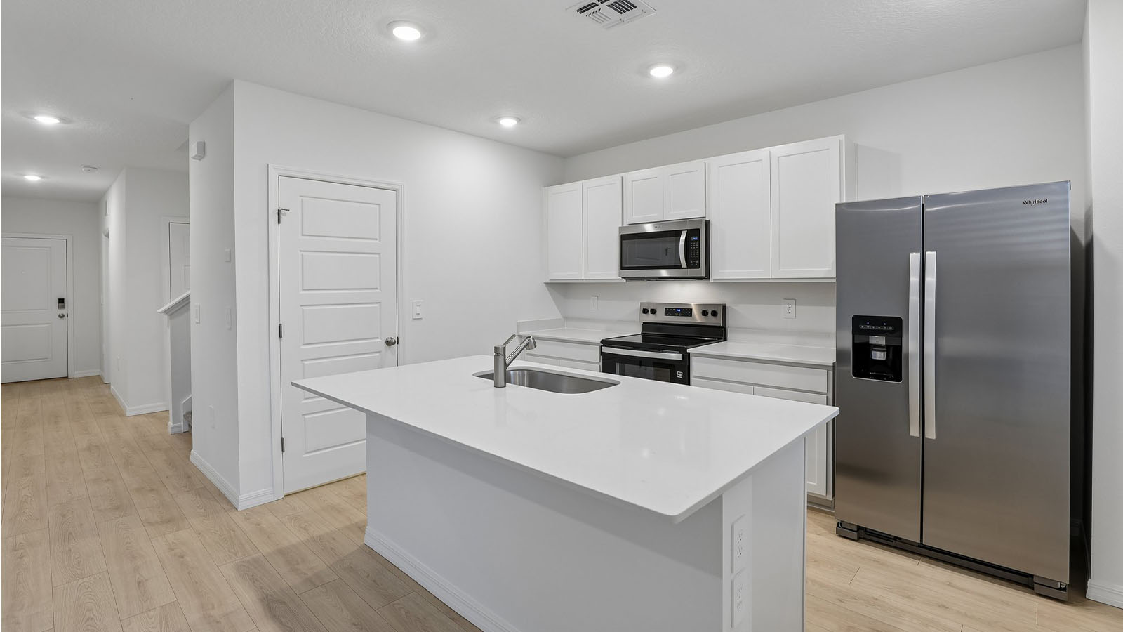 Kitchen Island with stainless steel appliances