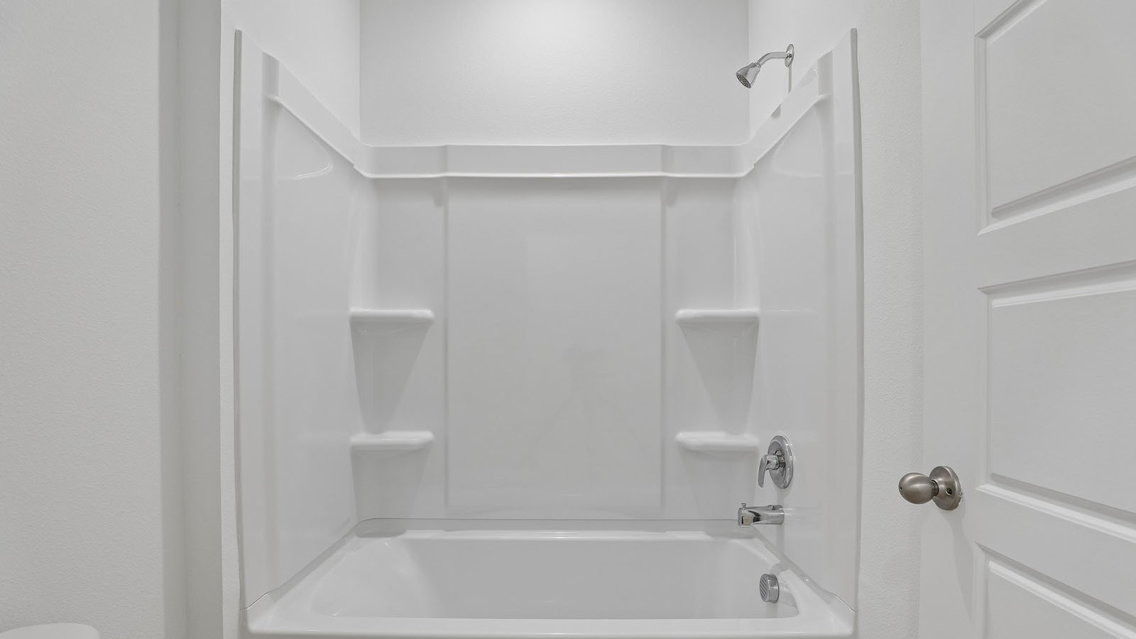 Downstairs full bathroom with a tub/shower