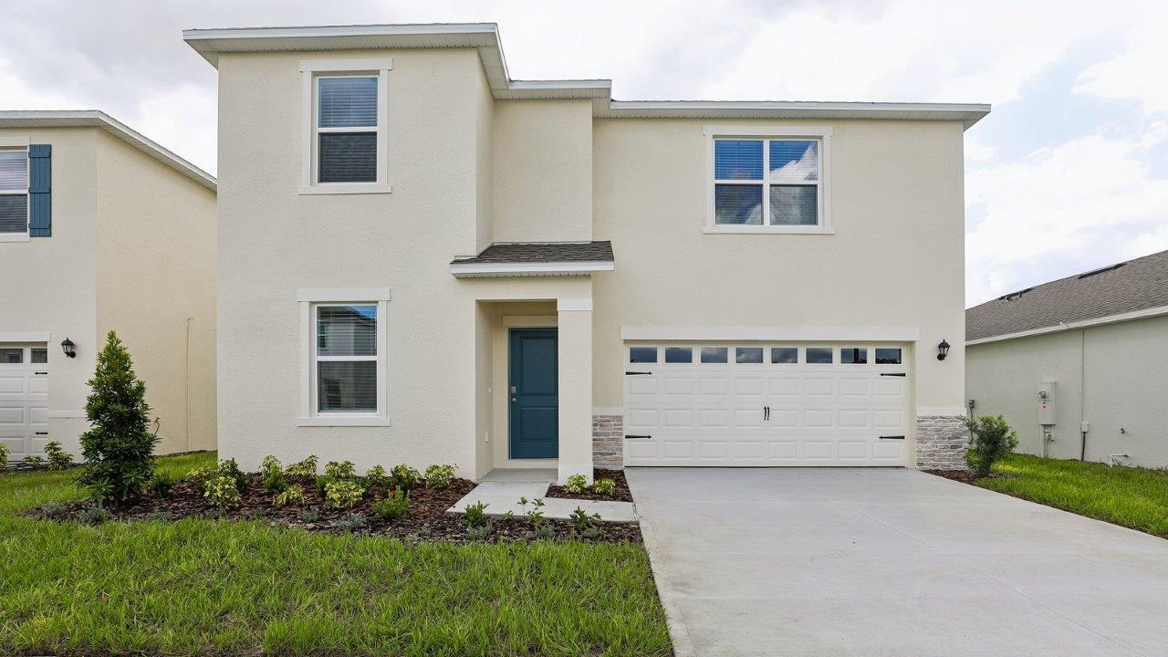 Exterior single family home with two car garage