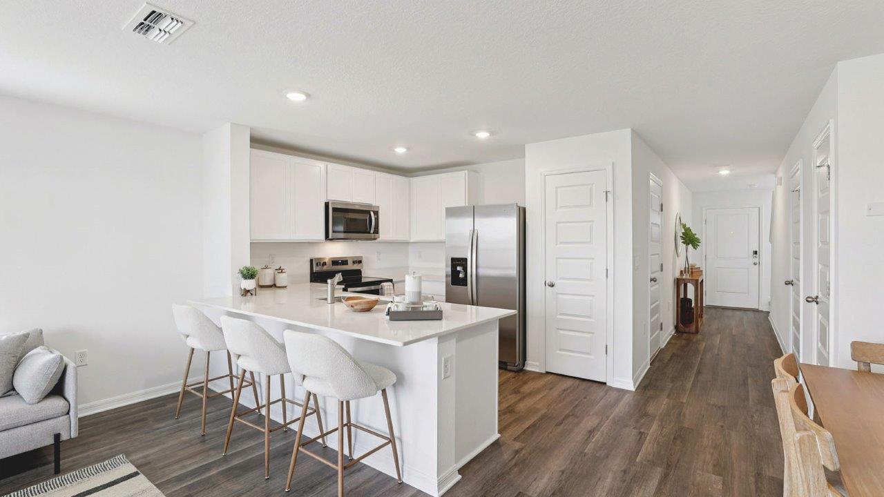 Overview of the home with kitchen and living rooom