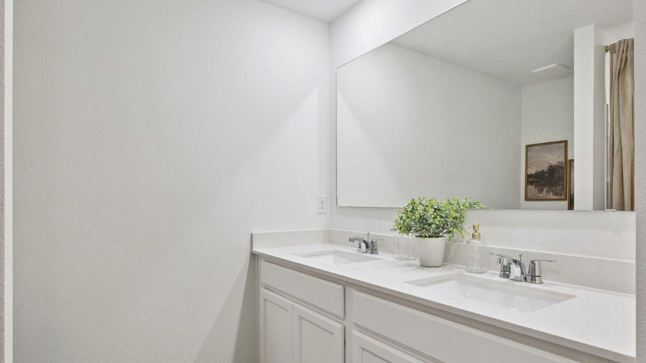 Primary bathroom with double vanity sink