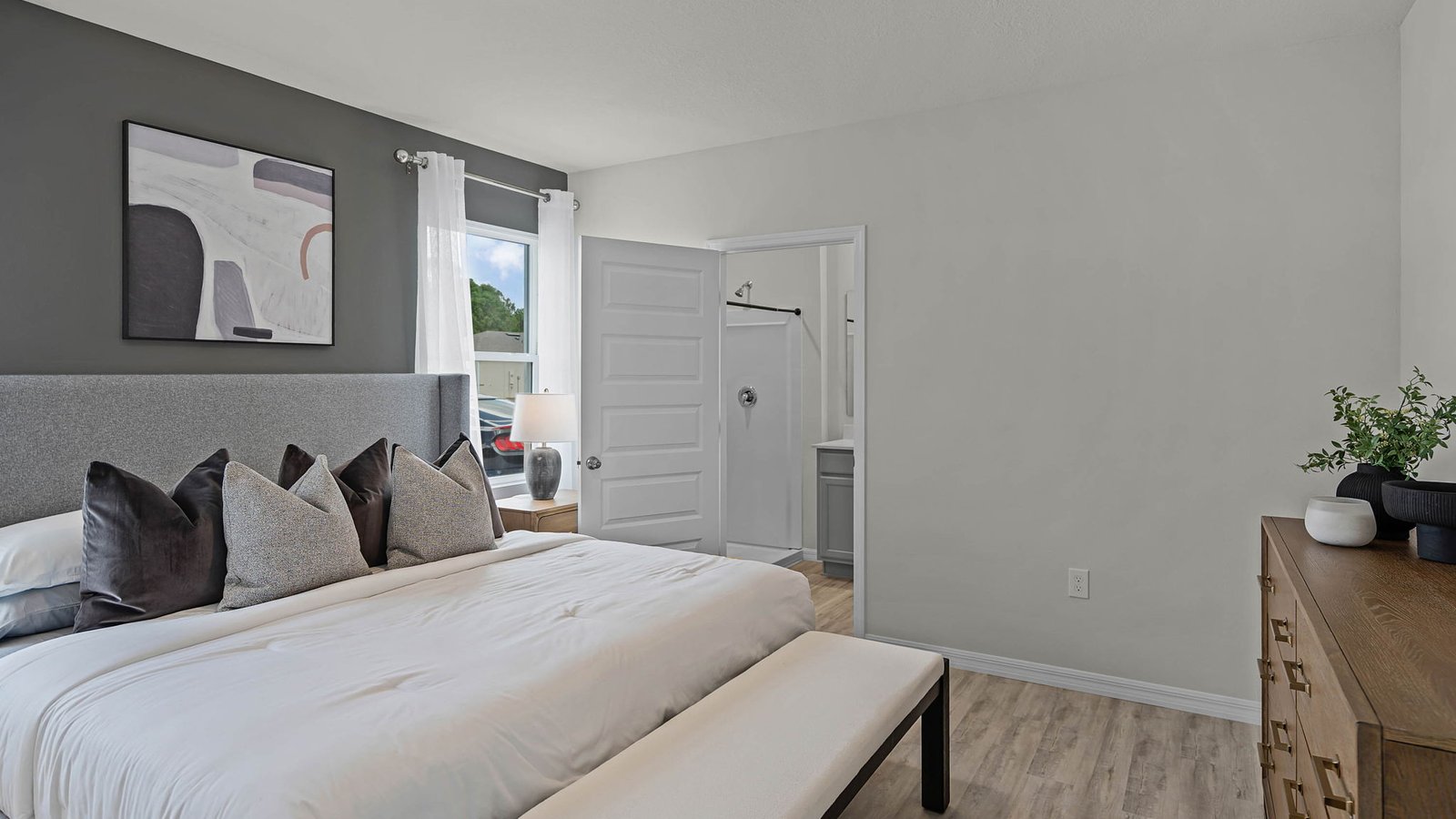 Primary bedroom with carpet flooring