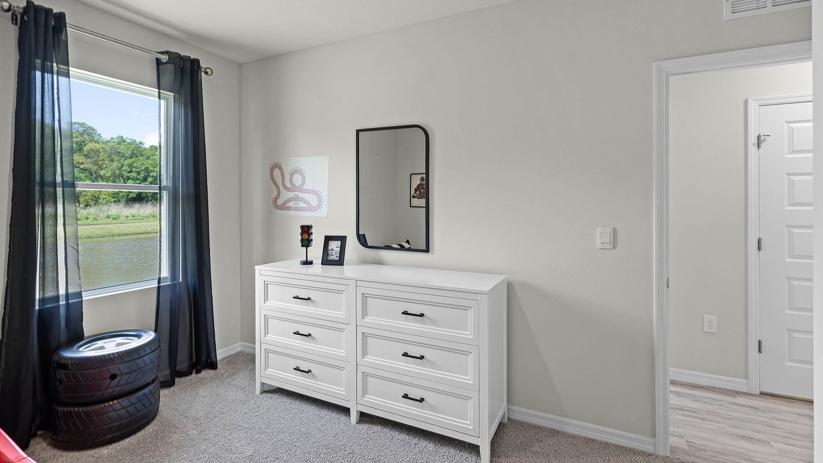 Guest bedroom with carpet throughout