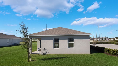 Rear exterior view of single-family home with covered patio