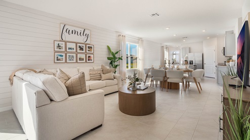 Living room with view of the dining area and kitchen