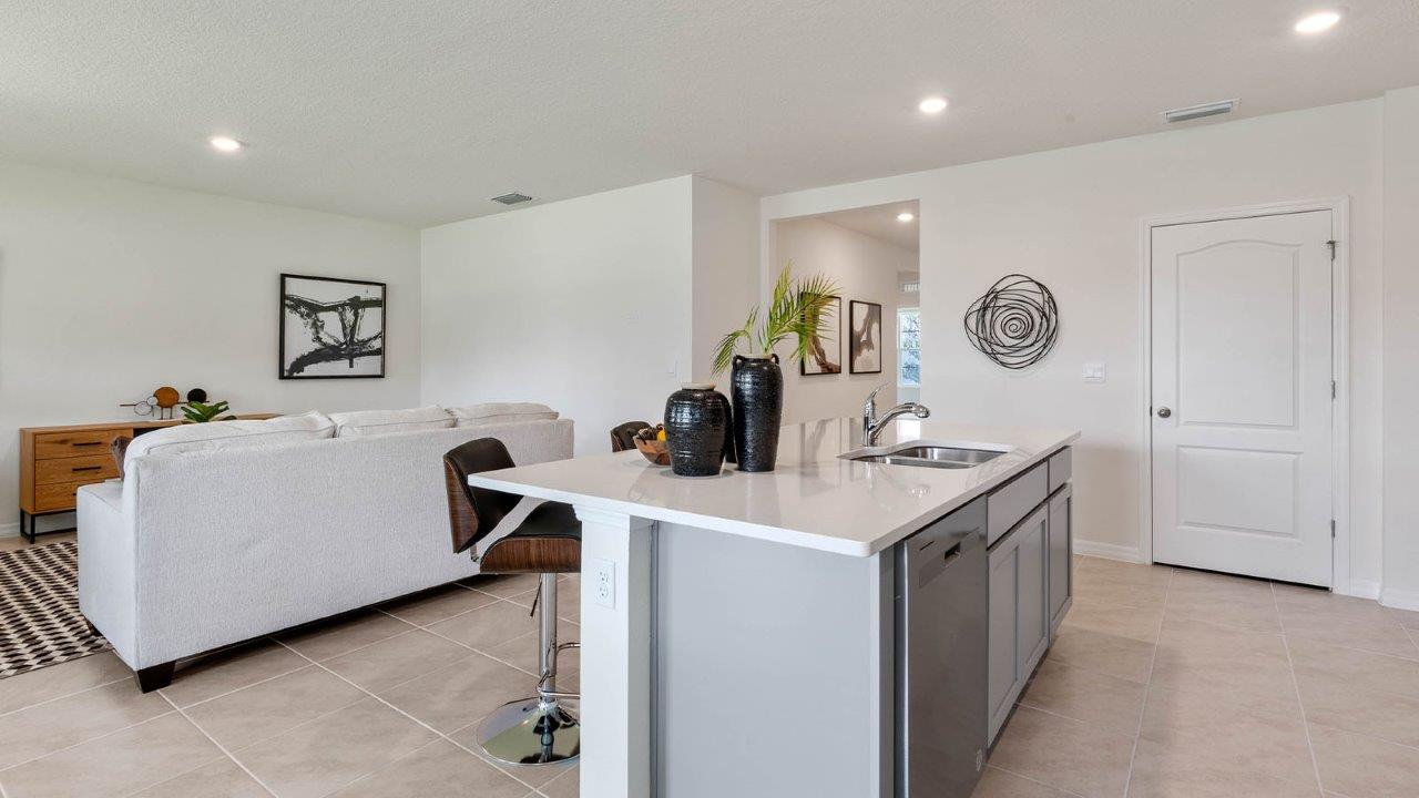 Kitchen with view of the living room