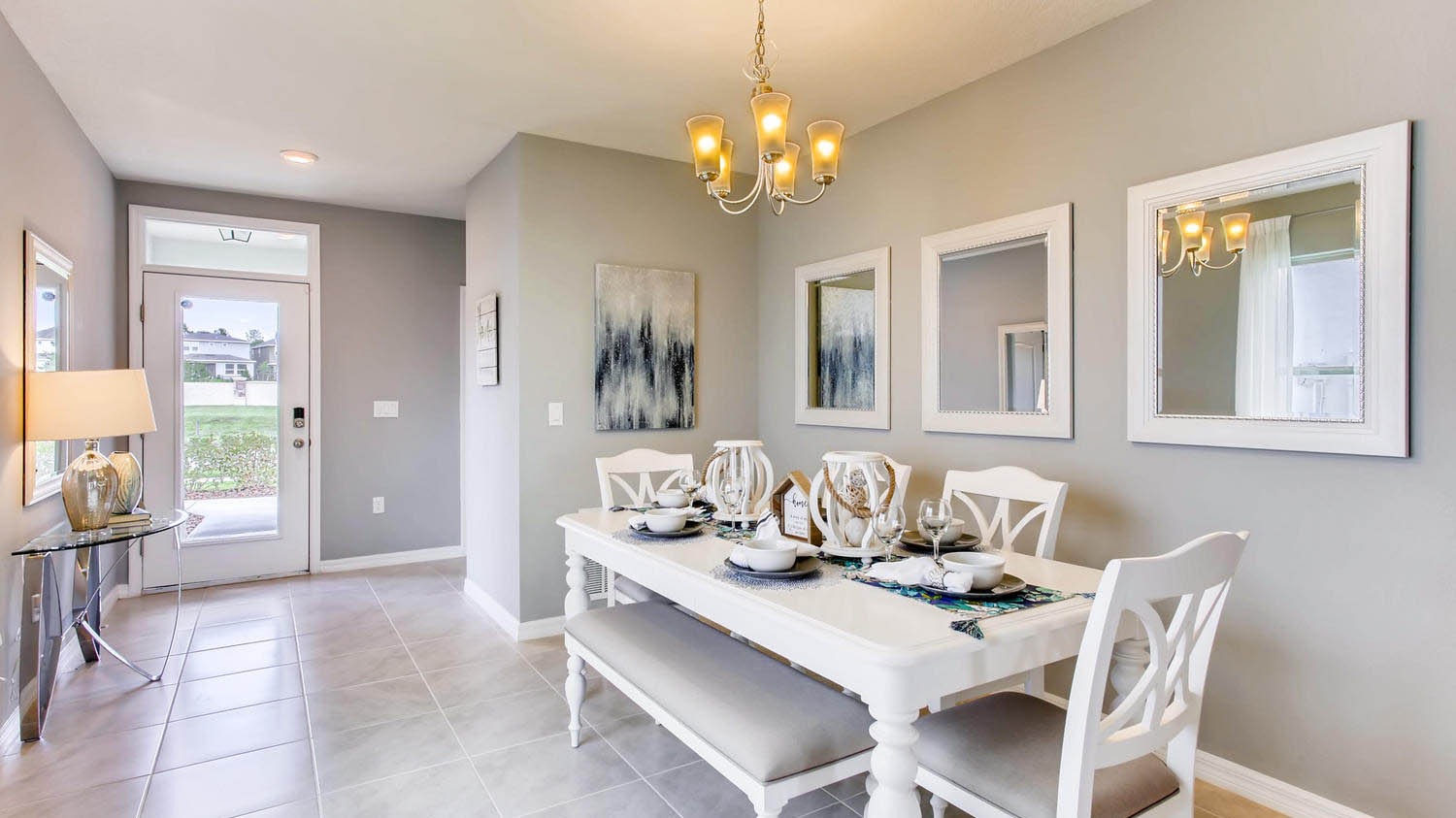 Dining Table and hallway leading to the front door