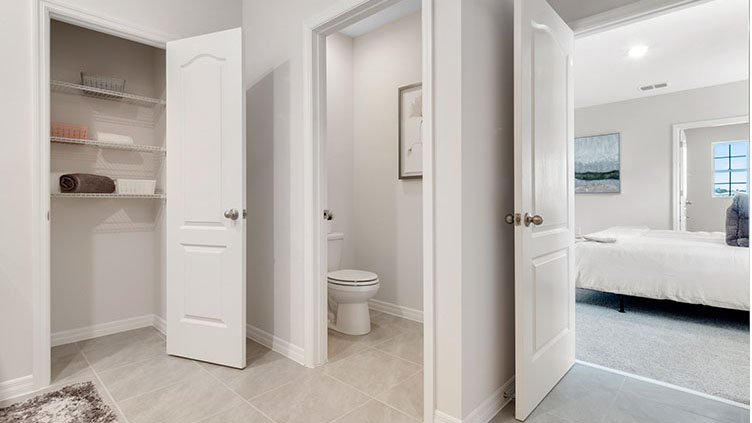 Primary bathroom with closet space