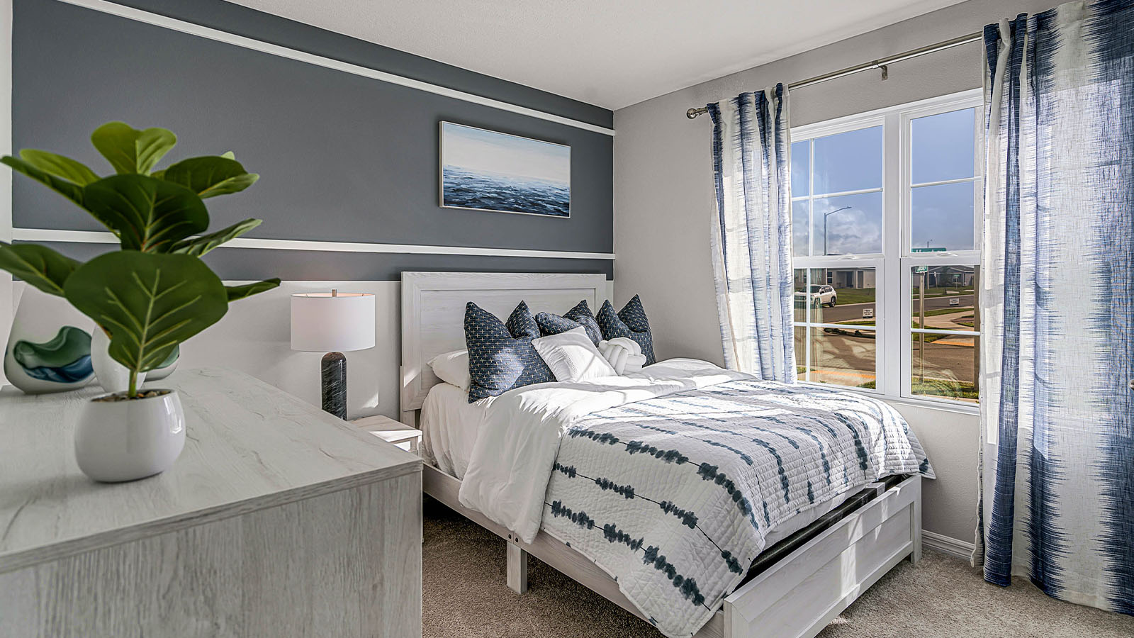 Guest bedroom with carpet throughout