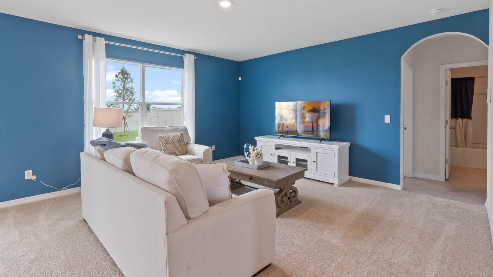 Living room leading to the guest bedroom