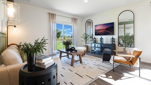 Bright and spacious living room with patio doors